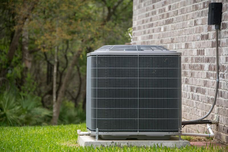 air conditioner installed outside of a home
